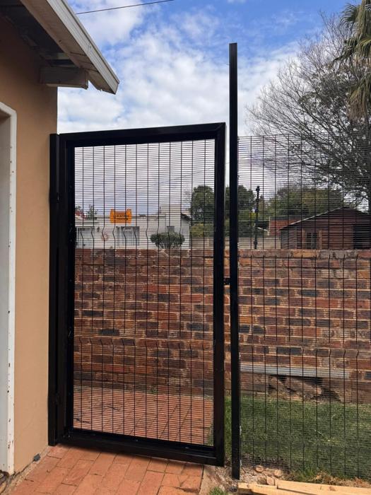 Clearview gate next to a house
