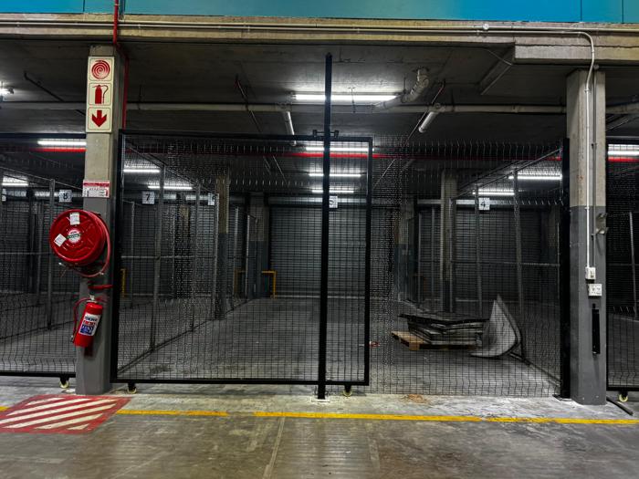 Clearview cages in an underground parking garage